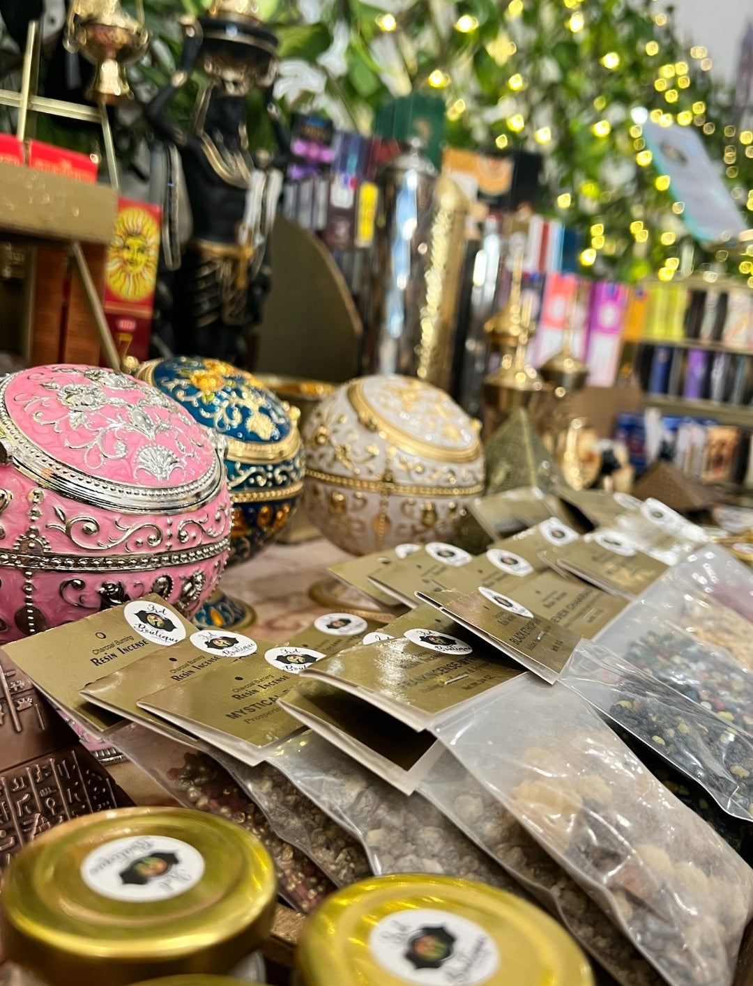Close up of ashtrays, resin incense, incense sticks